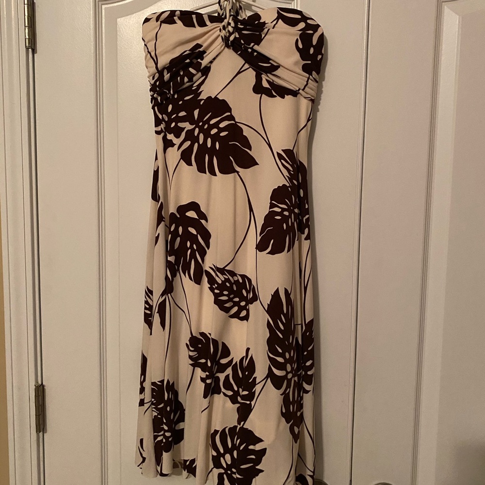 Off white dress with brown leaves.